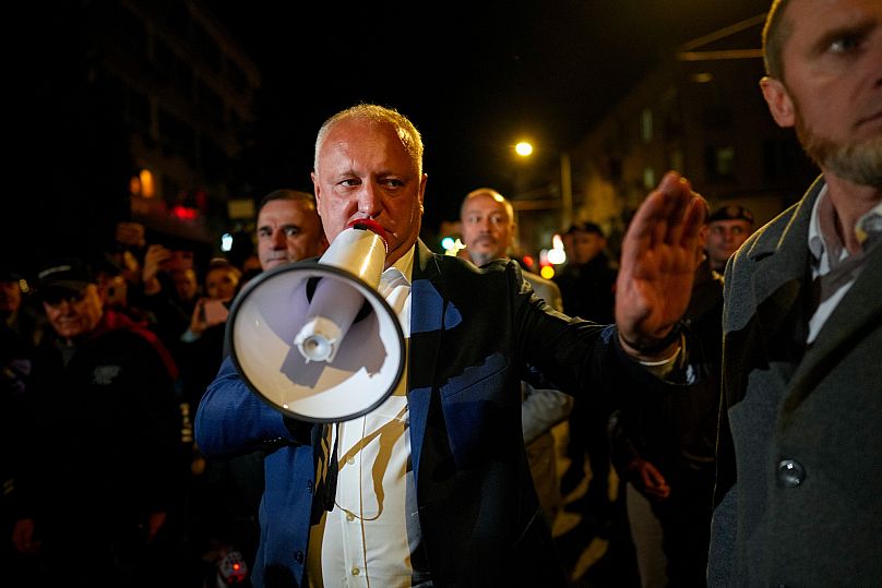 Former Moldovan President Igor Dodon, a member of the Russia-friendly Patriotic Electoral Bloc, speaks to supporters  after the polls closed for the parliamentary election. 