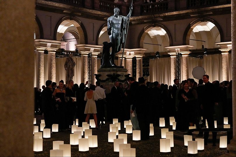 A bronze copy of Antonio Canova's marble statue (1803-06) of Napoleon Bonaparte as Mars the Peacemaker stands in the Brera art museum courtyard as guests arrived, 28 Sept 2025