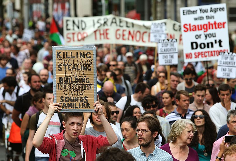 People take part in a protest march in Dublin to call for an end to Israeli military action in Gaza and justice and freedom for Palestine, 19 July, 2014