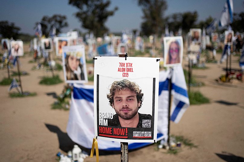 A poster depicting Israeli hostage Alon Ohel is displayed in Re'im, southern Israel, at the Gaza border, Feb. 26, 2024.
