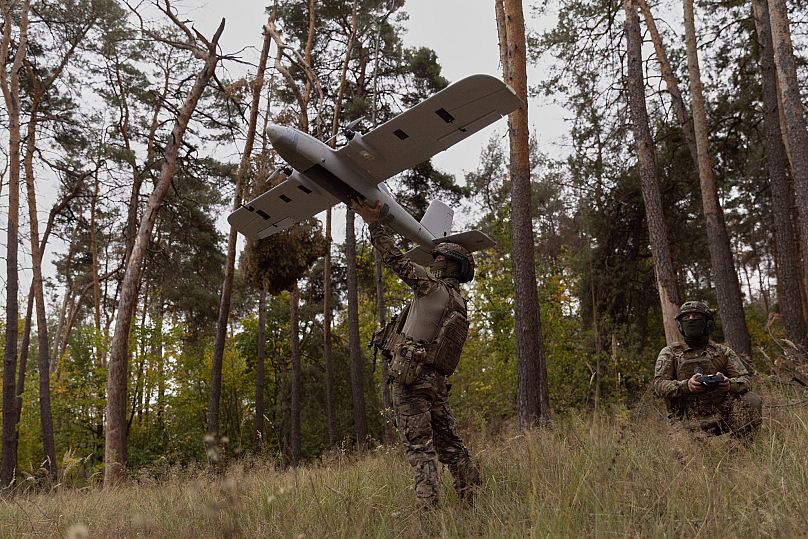 Ukrainian soldiers prepare to launch an Avenger UAV drone in Ukraine's Kharkiv region, 24 September, 2025