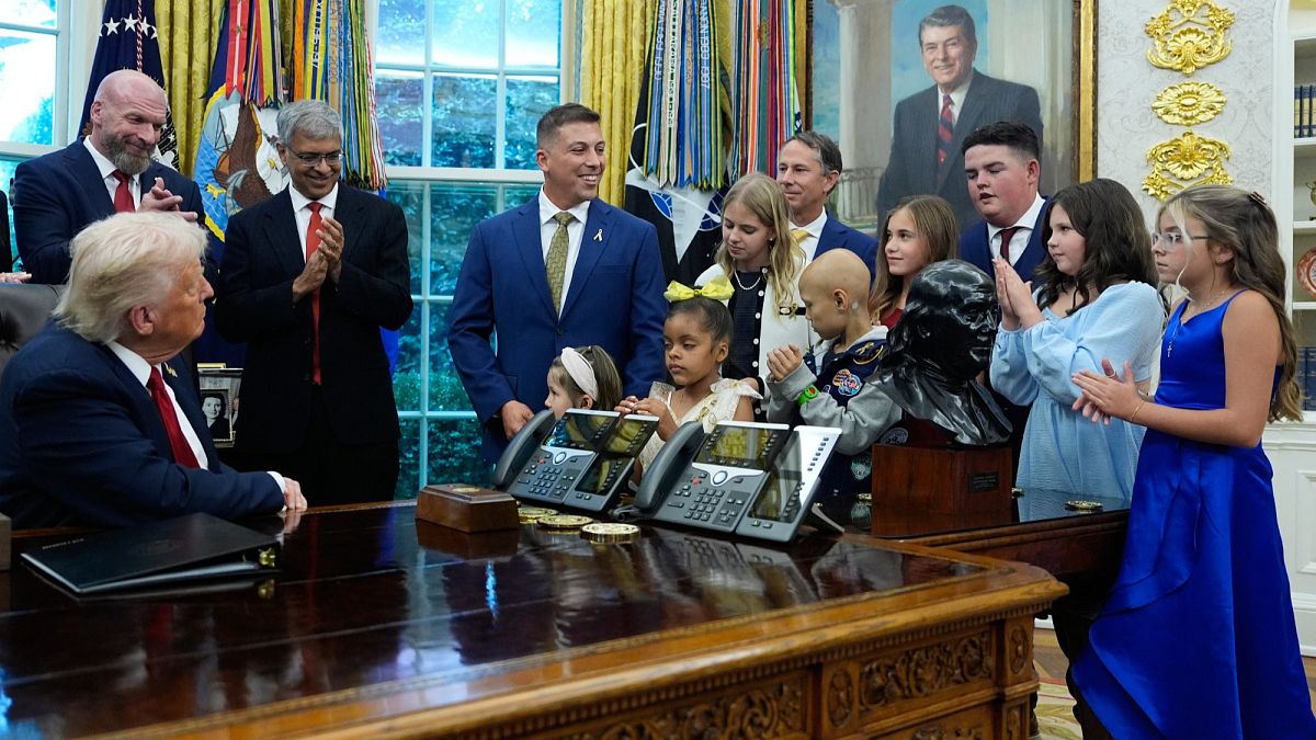 Donald Trump signs executive order to use AI in fight against childhood cancer