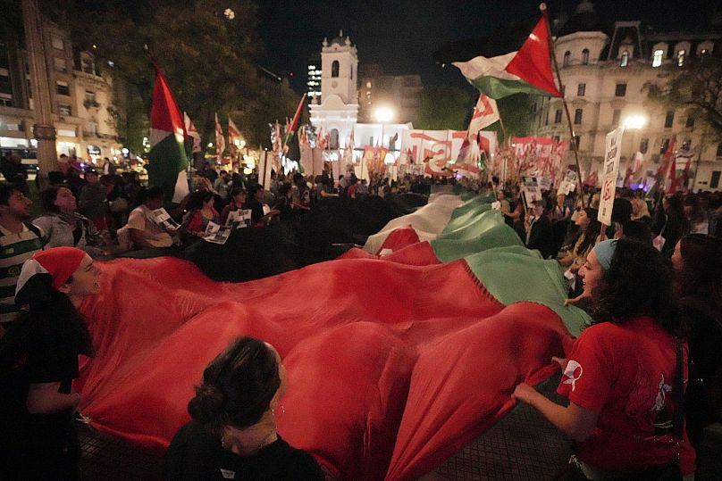 Pro-Palestinian demonstrators protest after ships were intercepted by Israeli navy, Buenos Aires, Argentina, Wednesday, Oct. 1, 2025. 