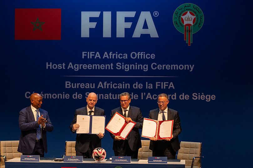 Morocco's prime minister Aziz Akhannouch, third from left, during a signing ceremony of FIFA Africa office in Marrakech, 16 December, 2024