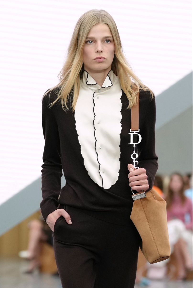 A model wears a creation as part of Dior's Spring/Summer 2026 collection presented in Paris, 1 Oct 2026