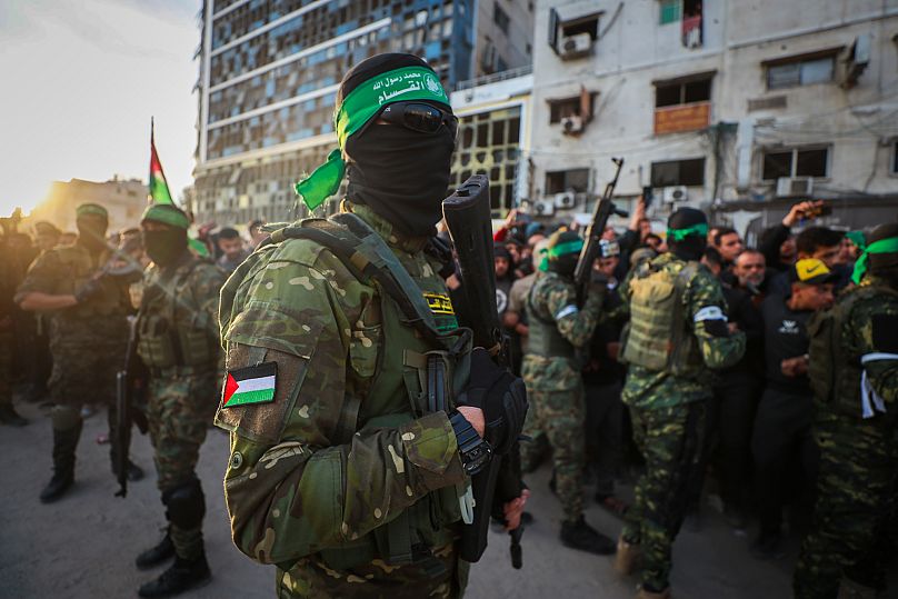 Fighters from the Qassam Brigades, the military wing of Hamas, in Gaza City, 19 January, 2025