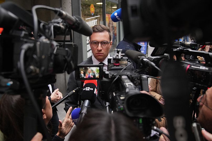 French far-right National Rally party president Jordan Bardella answers reporters’ questions in Paris, 6 October, 2025 