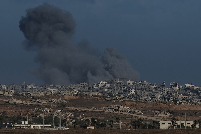 Smoke rises following an Israeli army bombardment in the Gaza Strip, as seen from southern Israel, Tuesday, Oct. 7, 2025. 