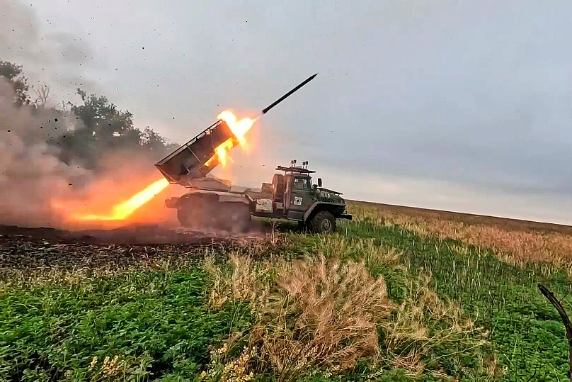 A Russian "Grad" self-propelled 122 mm multiple rocket launcher fires towards Ukrainian positions on an undisclosed location in Ukraine, 6 October, 2025
