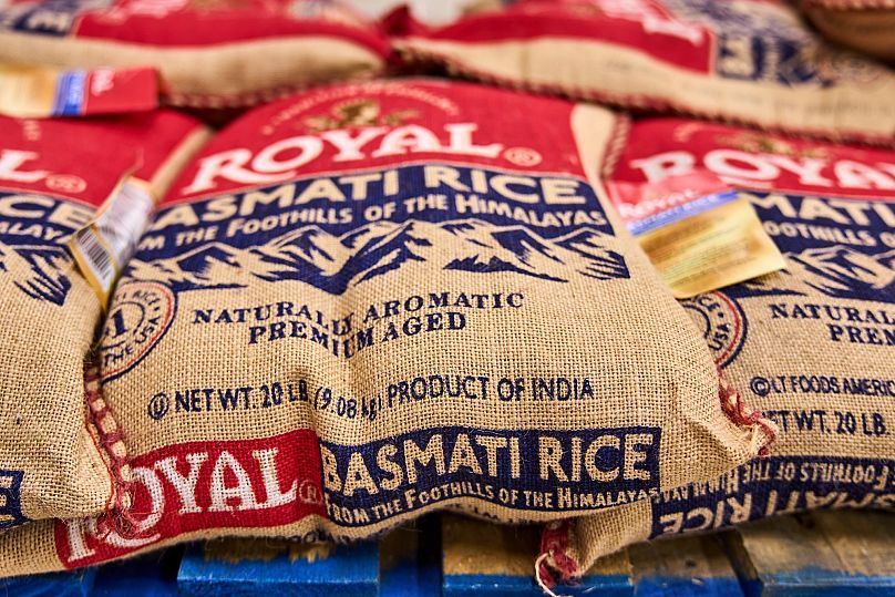 FILE: Sacks of Royal Basmati extra long rice imported from India are sold at Koseli Mart in Artesia, 7 April 2025