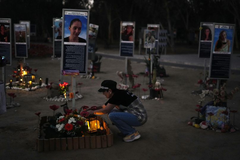 People visit the site of the Nova music festival, where hundreds of revelers were killed and abducted by Hamas and taken into Gaza, Tuesday, Oct. 7, 2025