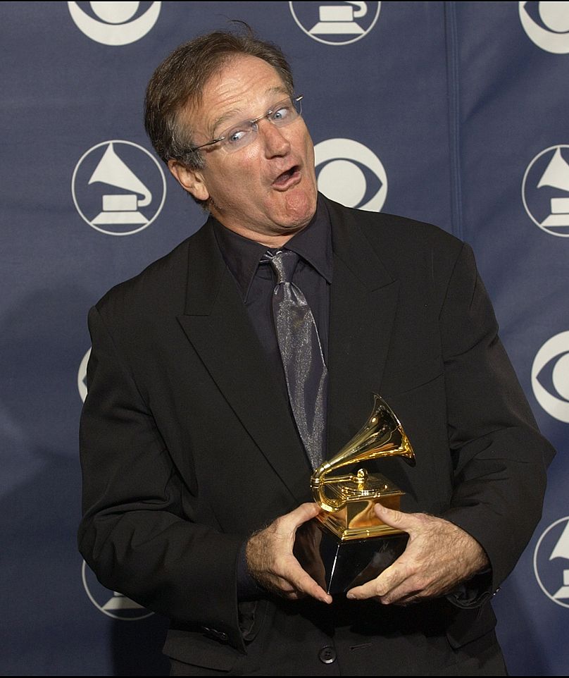Robin Williams with his Grammy for Best Spoken Comedy Album "Robin Williams - Live 2002" - 2003
