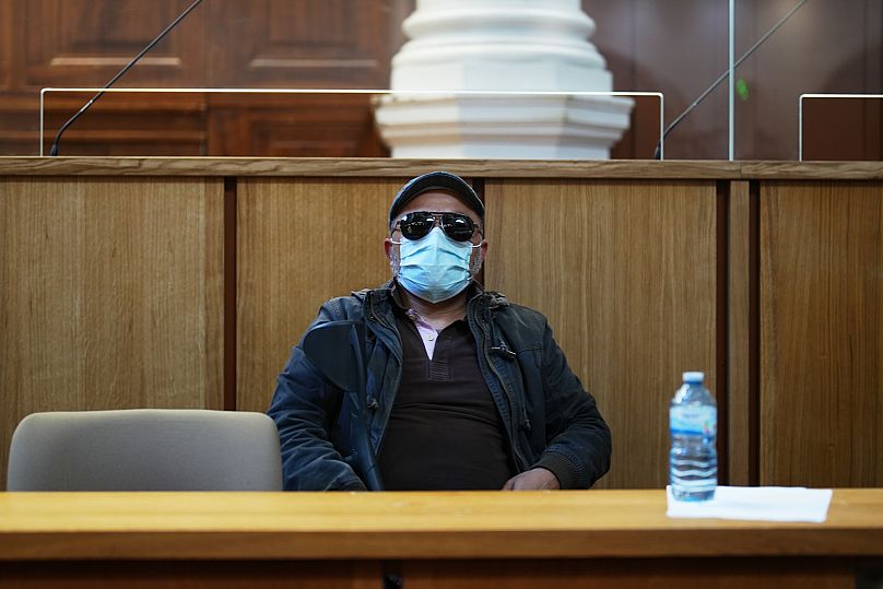 Husamettin Dogan sits in an appeals court set to hear his case challenging his conviction in the Gisele Pelicot case, Monday, Oct. 6, 2025 in Nimes, southern France. 