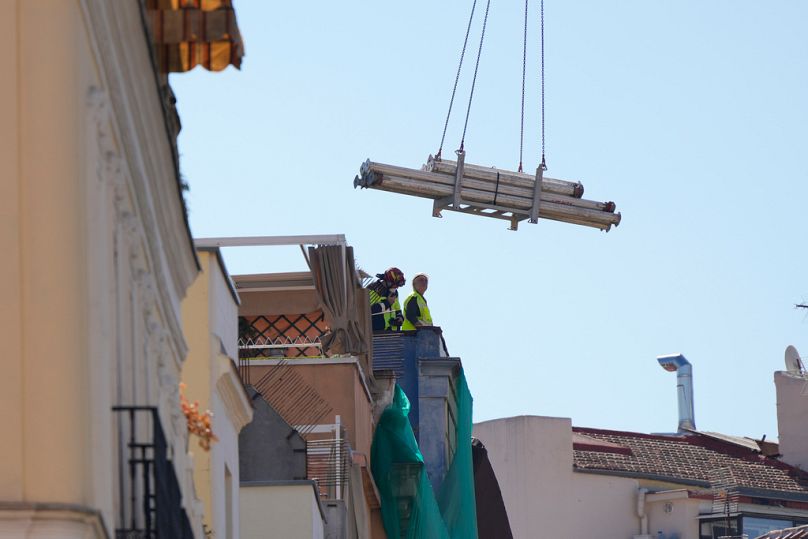 Rescue teams are on the roof of the collapsed building in Madrid, Spain, on Tuesday, 7 October 2025.