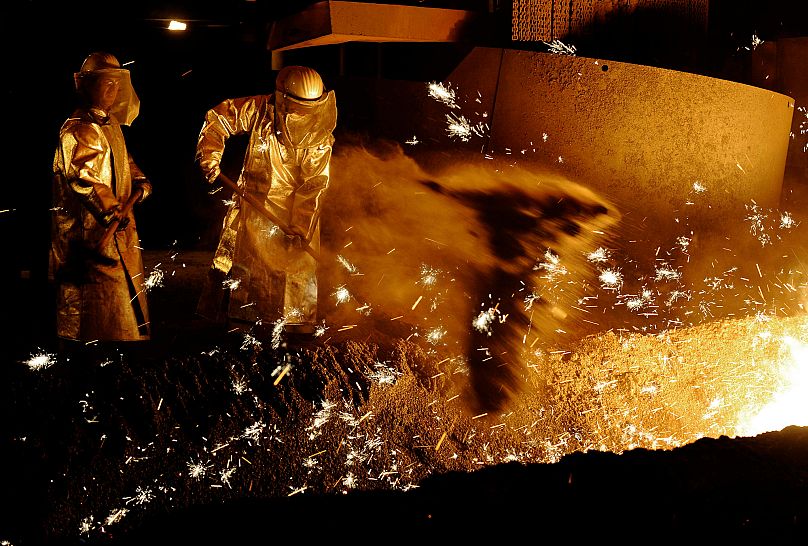 FILE: Steelworkers of German steel company Salzgitter AG are pictured in Salzgitter, 10 December 2008