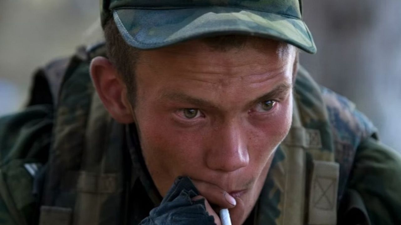 A Russian soldier smokes a cigarette near Gori. Conflict between Russia and Georgia over South Ossetia. 13 August 2008.
