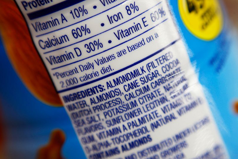 FILE: The ingredients label for almond milk at a grocery store in New York, 16 February 2017