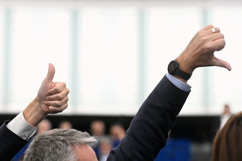 FILE: European Parliament members gesture at the European Parliament in Strasbourg, 6 October 2025