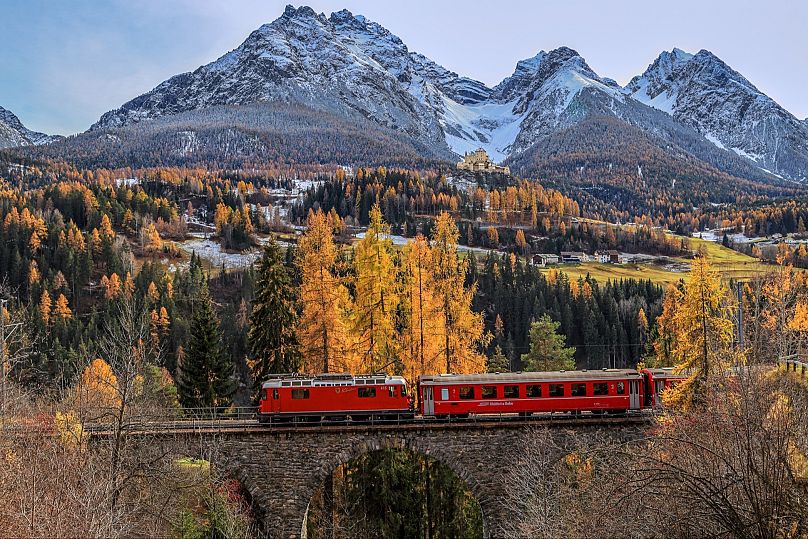 A train running along the Golden Pass Railway.