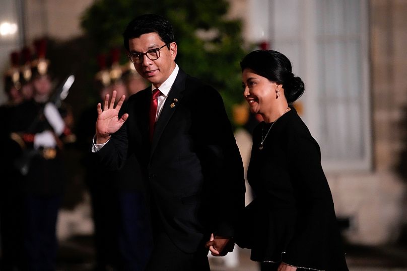 Madagascar's President Andry Rajoelina and his wife Mialy Rajoelina arrive for the 19th Francophonie Summit, at the Elysee Palace, in Paris, Friday, Oct. 4, 2024. (AP Photo/Lo