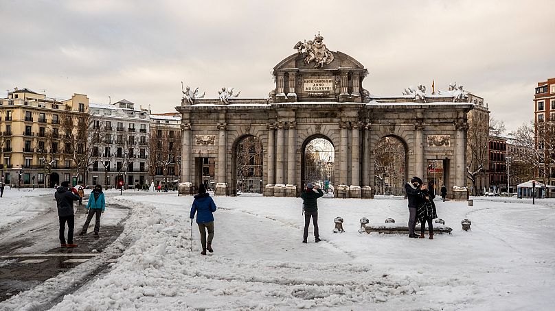 FILE: Madrid's Puerta de Alcalá square in the snow, 10 Jan, 2021