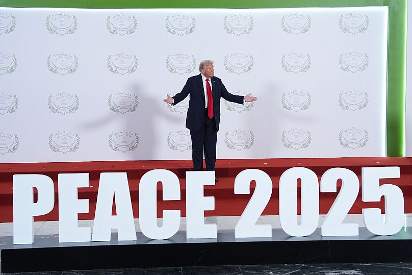 Donald Trump waits to greet leaders Israel-Hamas ceasefire in Gaza, Oct. 13, 2025, in Sharm El Sheikh, Egypt.