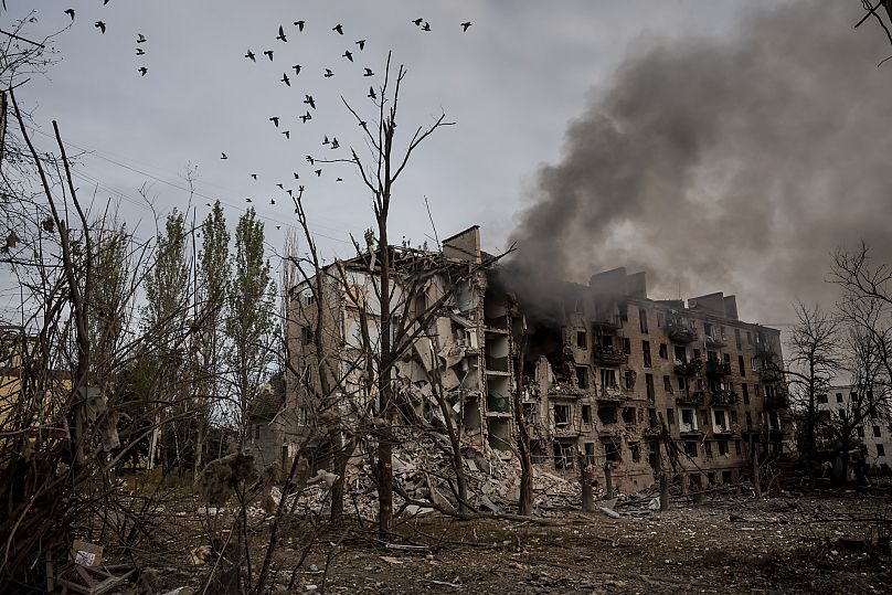 Birds fly over the ruins of a building in Kostiantynivka, 13 October, 2025