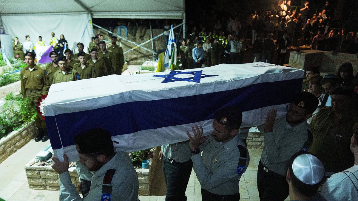 Israel receives remains of two more hostages as Hamas says time needed to reach others