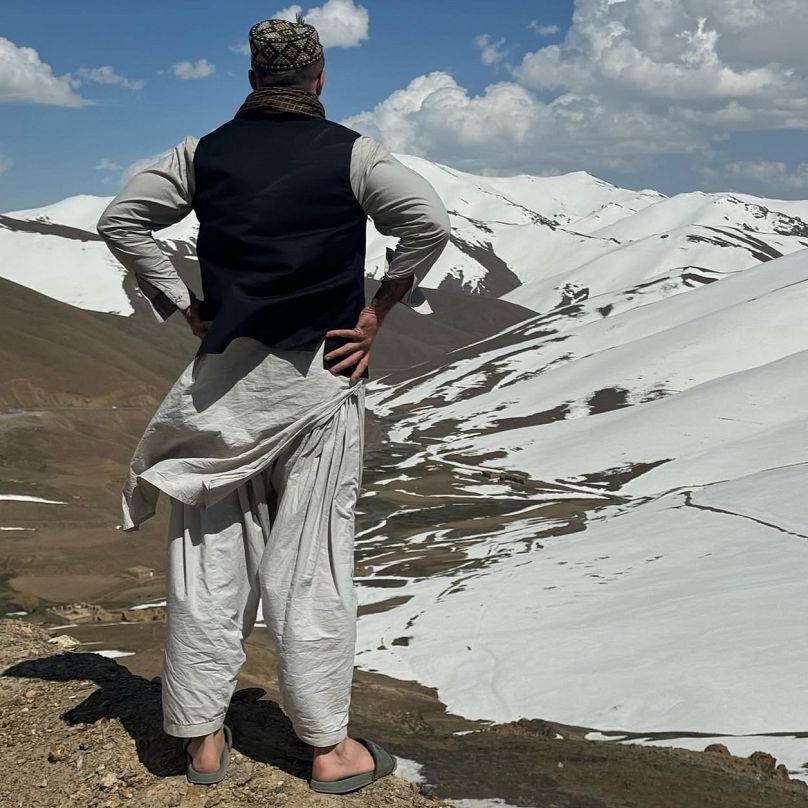 Brown facing Afghanistan's snow-capped mountains.