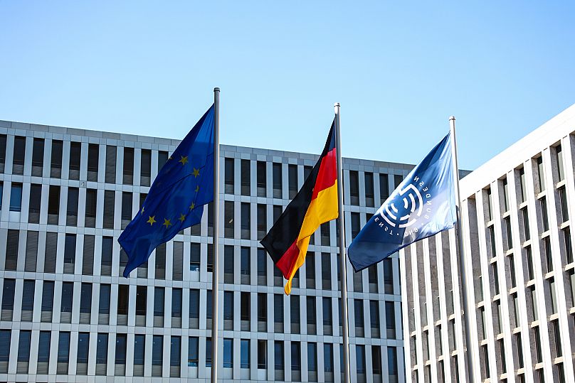 The flags of the European Union, Germany and the Bundesnachrichtendienst (BND) are seen in Berlin, 11 September, 2025
