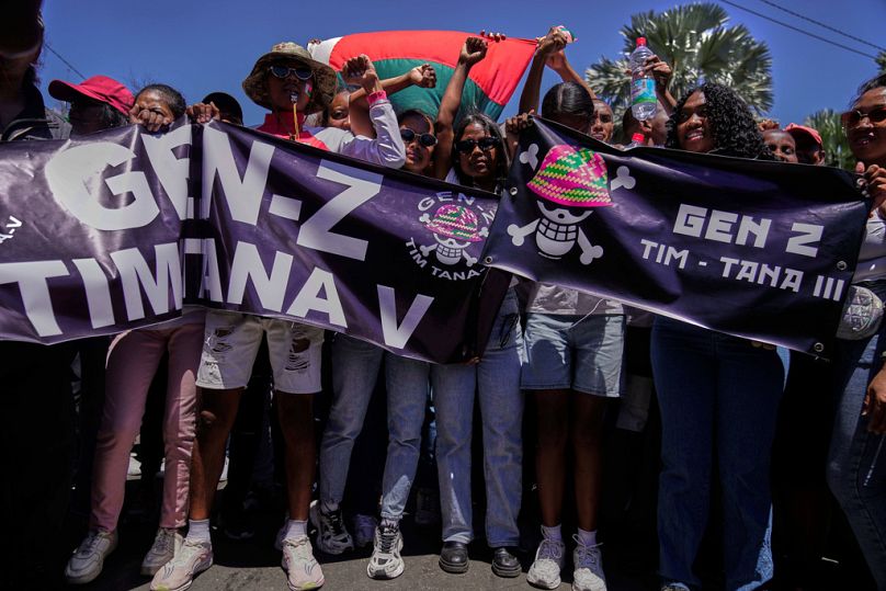 Protesters call for President Andry Rajoelina to step down in Antananarivo, Madagascar, Tuesday, Oct. 14, 2025.