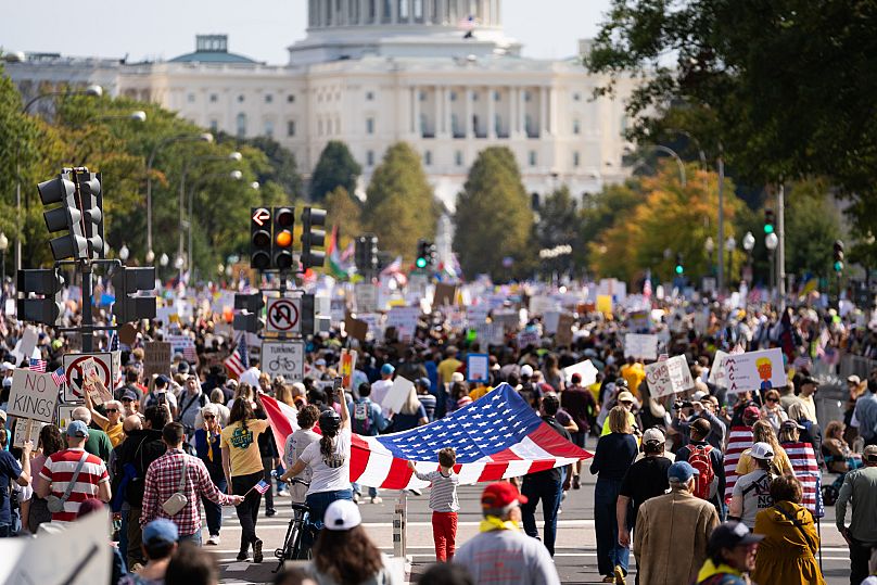 Crowds gather for a No Kings protest, Saturday, Oct. 18, 2025, in Washington. 