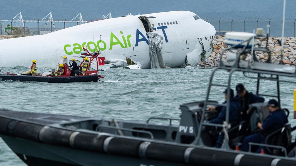 Two killed as plane skids off runway and crashes into sea in Hong Kong