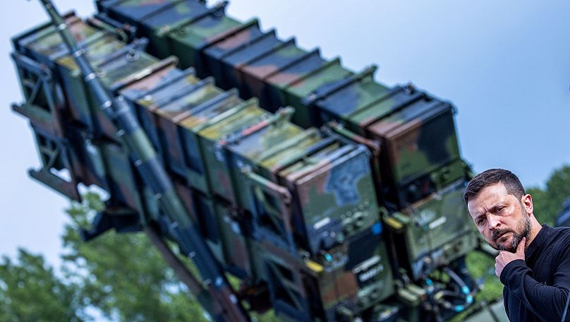 Ukraine's President Volodymyr Zelenskyy stands in front of a Patriot air defence missile system in the German state of Western Pomerania, 11 June, 2024