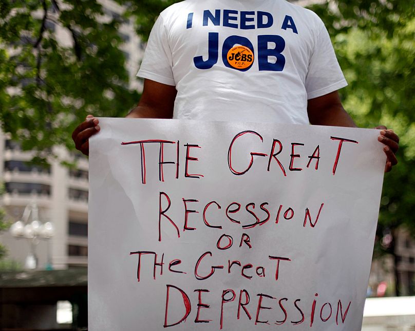 FILE - In this file photograph taken June 23, 2010, Frank Wallace who has been unemployed since May of 2009, displays his frustration during a rally in Philadelphia.