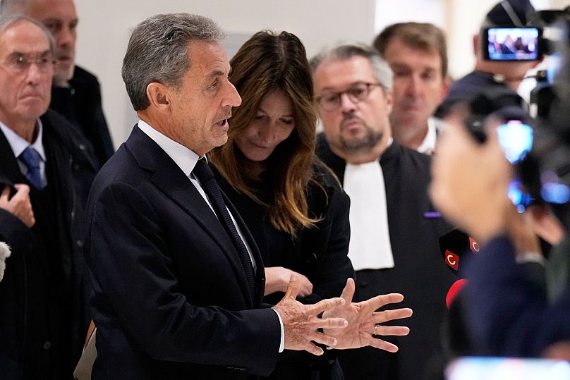Former French President Nicolas Sarkozy speaks with the media being sentenced by a court in Paris, 25 September, 2025 