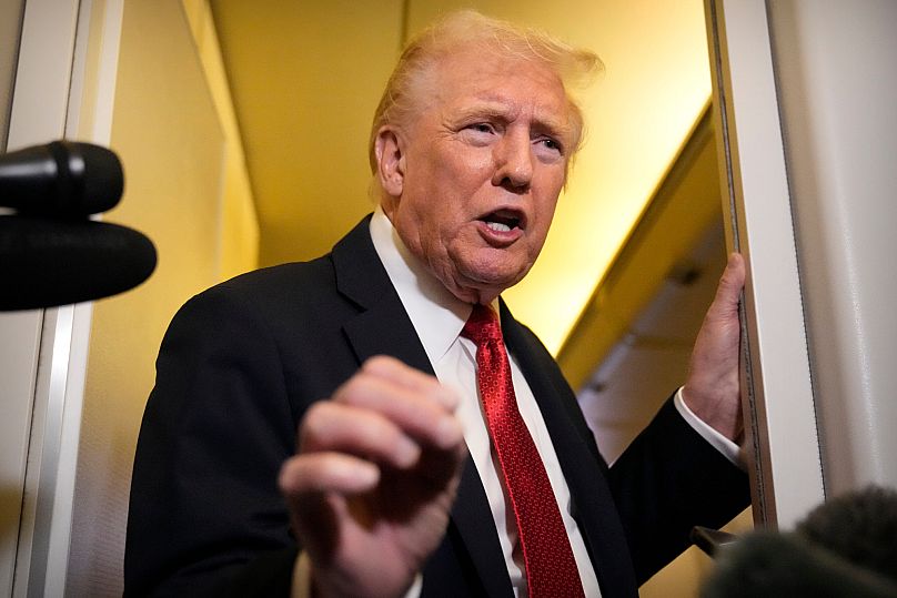 US President Donald Trump speaks to reporters aboard Air Force One, 19 October, 2025