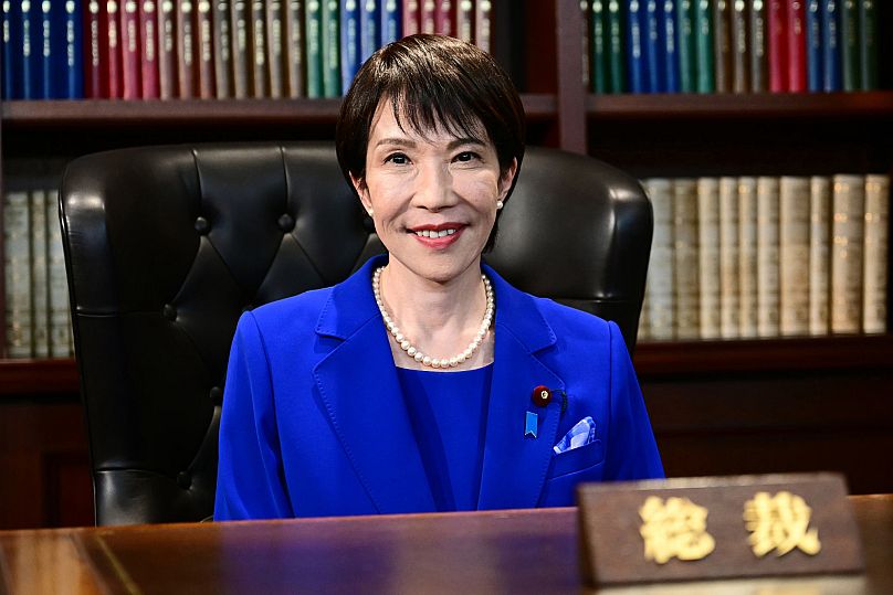 Sanae Takaichi, the newly elected leader of Japan's ruling party, the Liberal Democratic Party (LDP), poses in the party leader's office after the LDP leadership election in T