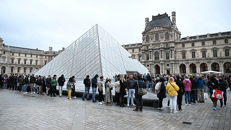 Large crowds lined up to enter the Paris Louvre museum on Monday despite news of its closure after Sunday's jewel heist, 20 Oct 2025