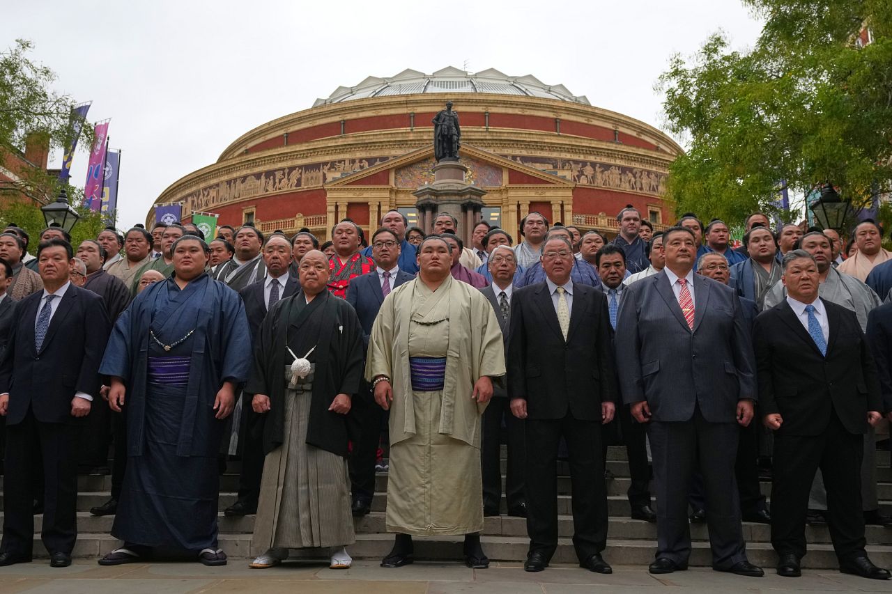 Sumo wrestlers, called rikishi, pose for a photocall ahead of The Grand Sumo Tournament at the Royal Albert Hall in London, 15 October 2025.