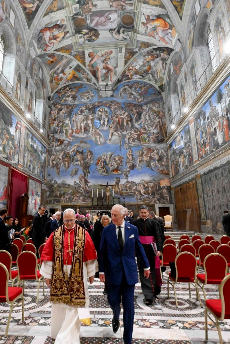 Britain's King Charles III and Pope Leo XIV leave the Sistine Chapel at the Vatican after a joint prayer on the theme 'Care for Creation', 23 Oct 2025 