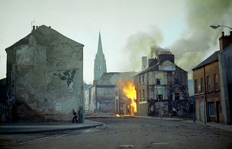 A building burns in Londonderry in the aftermath of Bloody Sunday, February, 1972