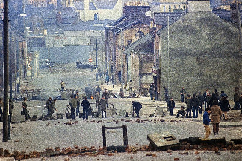 British troops release smoke bombs to control minor but persistent disturbances in Londonderry, February, 1972