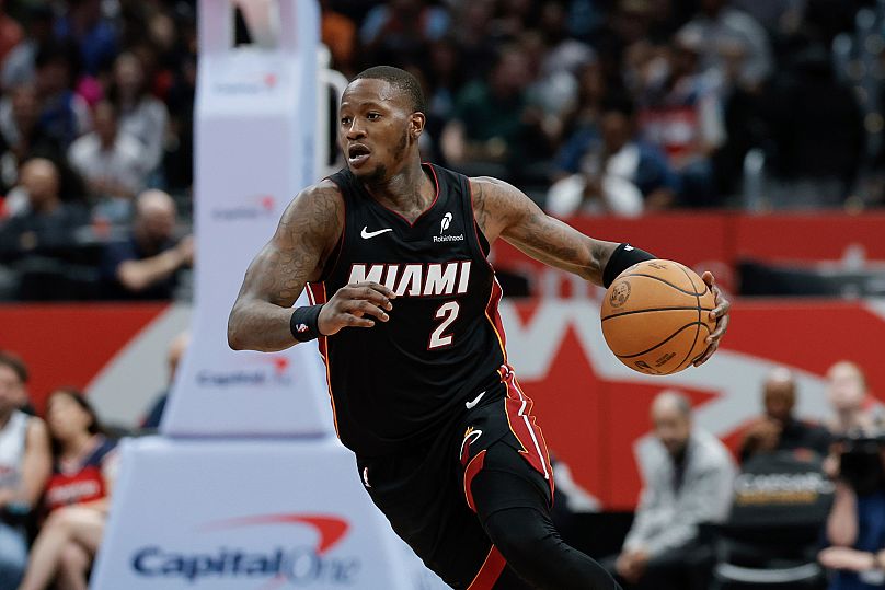 Miami Heat guard Terry Rozier brings the ball up court during the second half of an NBA game in Washington, 31 March, 2025
