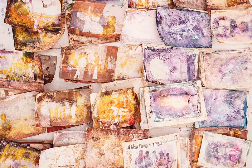 Damaged family photos recovered from the devastating flash floods last year in Valencia, 16 January, 2025