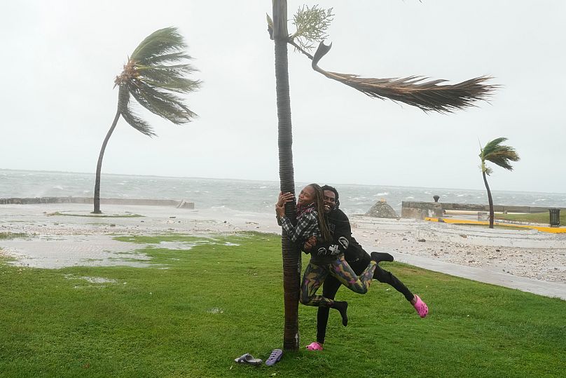 People take shelter in a school ahead of Hurricane Melissa's forecast arrival in Old Harbour