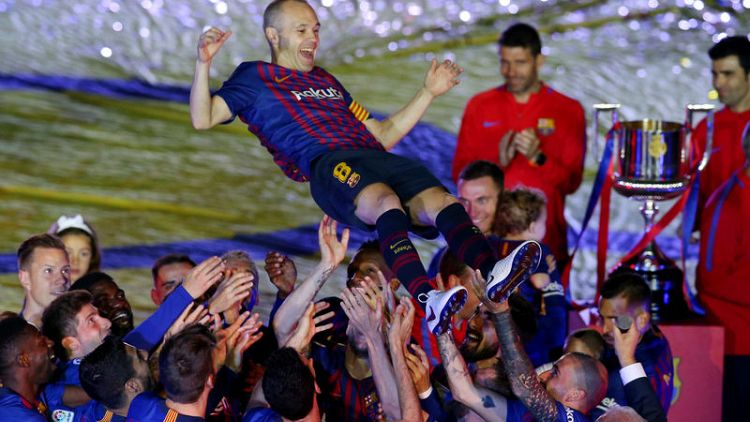 Champions Barca bid Iniesta farewell after beating Sociedad