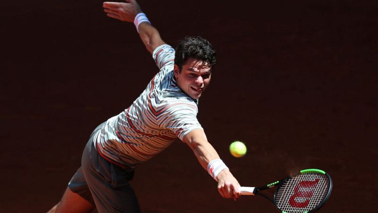 Raonic pulls out of French Open with knee injury