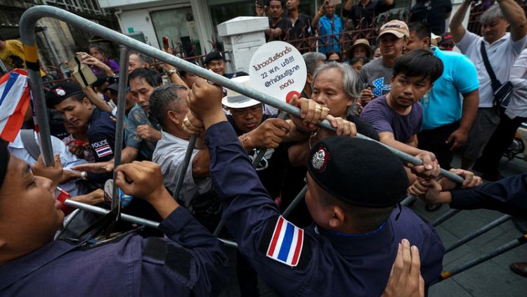 مواجهة بين شرطة تايلاند ومحتجين نظموا مسيرة مناهضة للحكومة