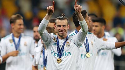 Super Bale sinks Liverpool as Madrid make it three in a row Super Bale sinks Liverpool as Madrid make it three in a row